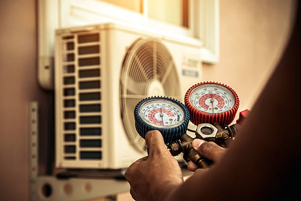 Professional Hvac technician working in Riverside, RI